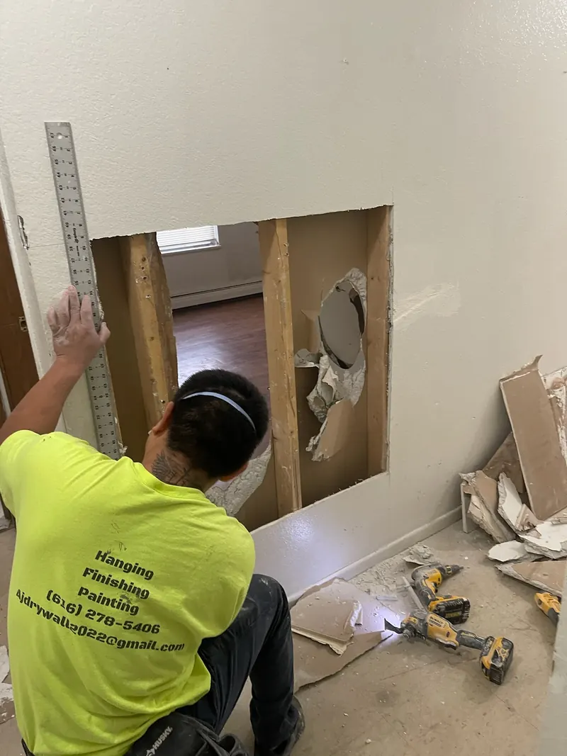 Wall repair and patching project by AJ Drywall